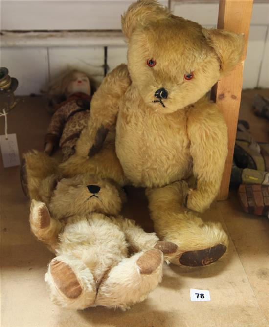 2 teddy bears and a doll